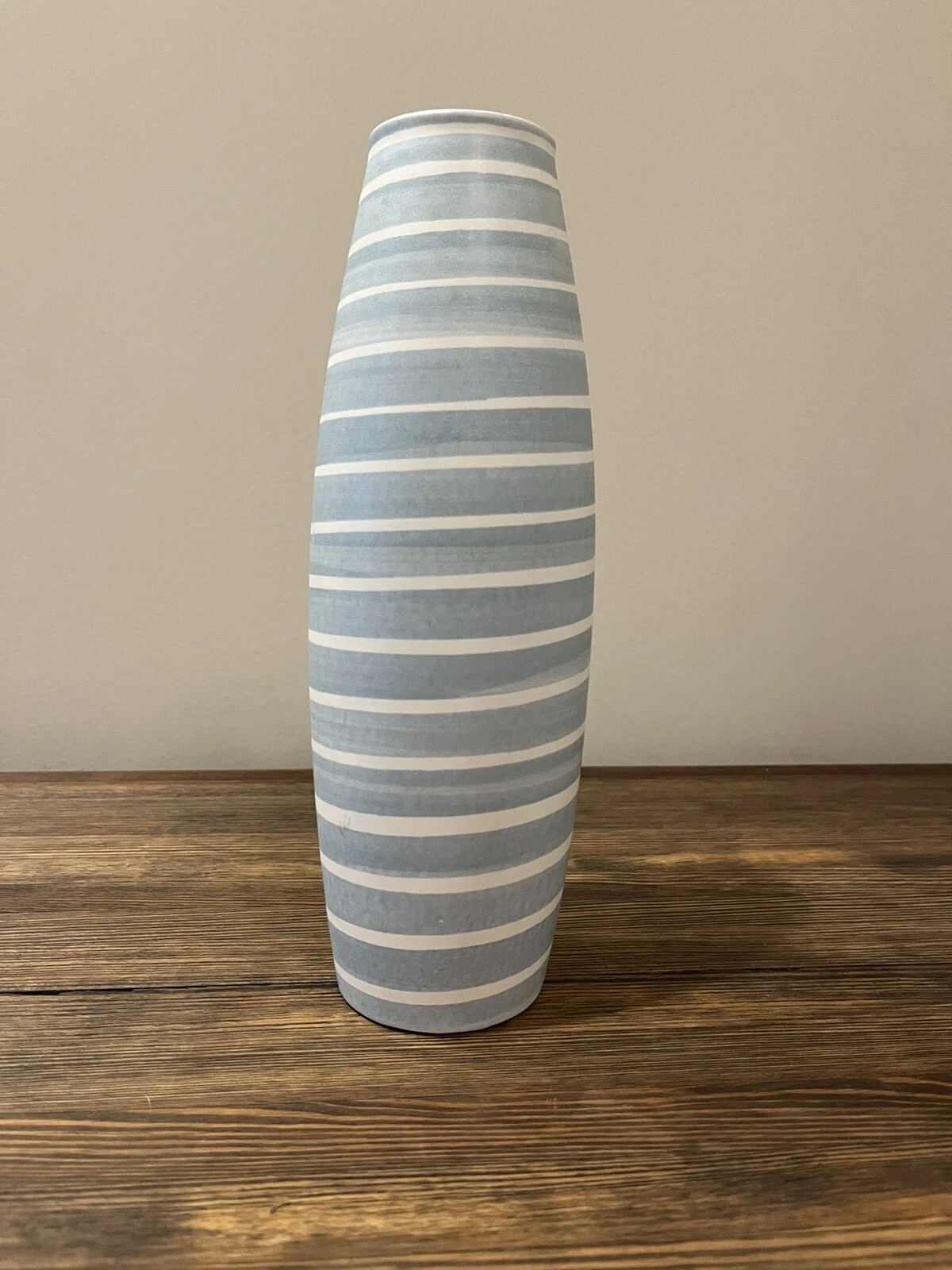 Tall white Amano vase with blue horizontal stripes
