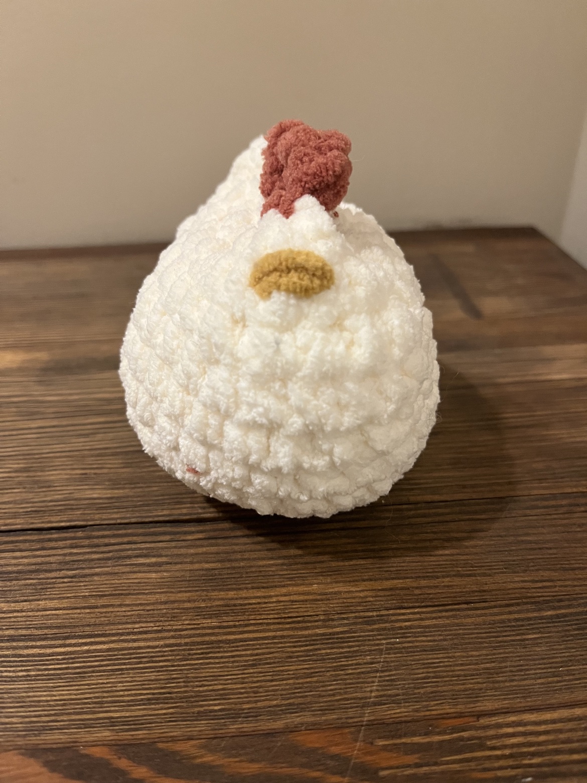 Front view of the crochet white chicken
