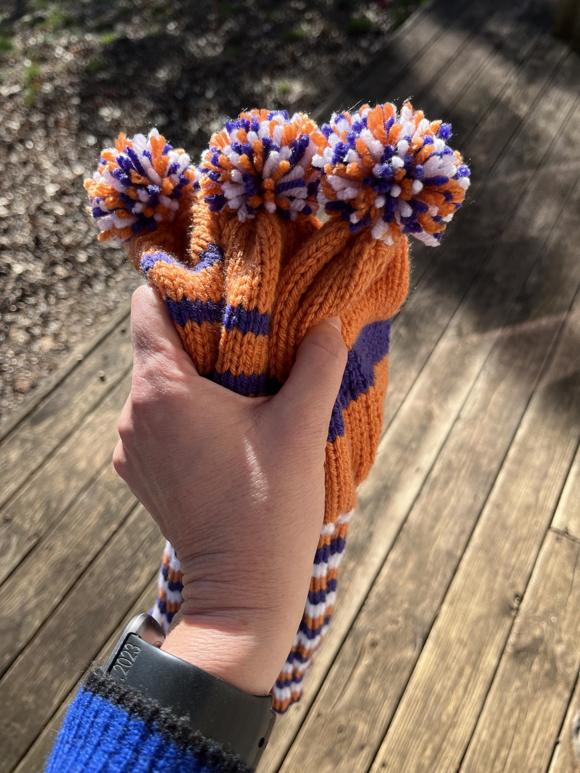 Crocheted flower bouquet in purple, orange, and cream