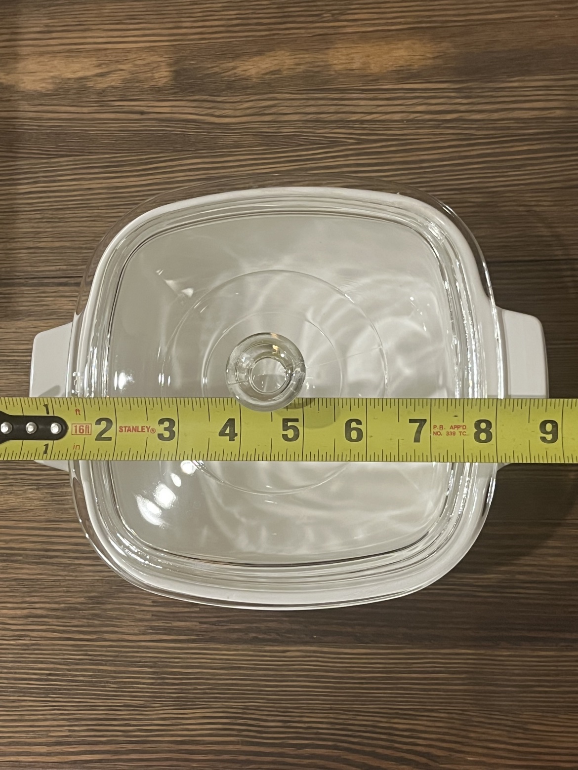 Top-down view with a tape measure showing about 8 inches wide