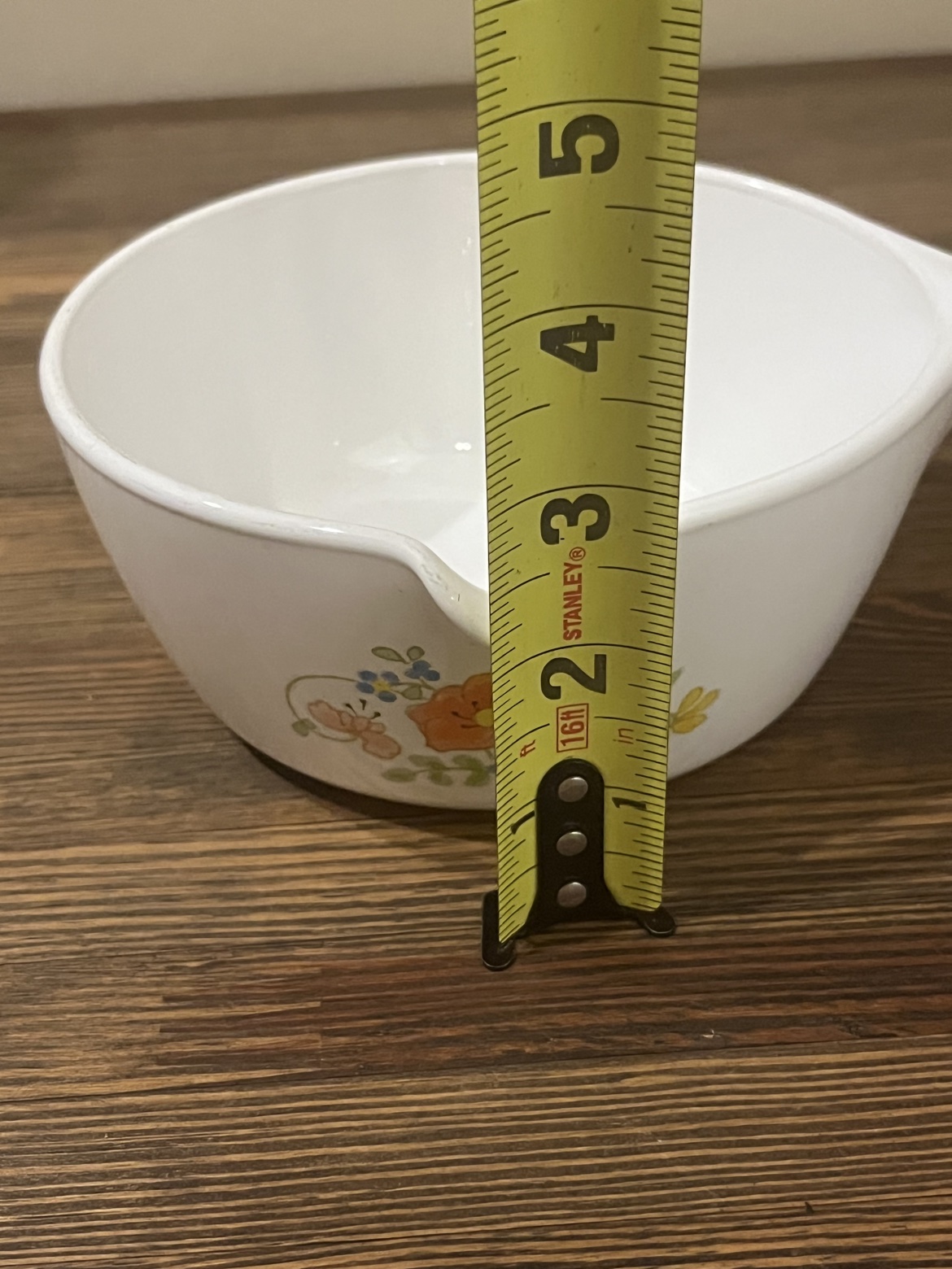 Side view with a tape measure showing about 3 inches tall