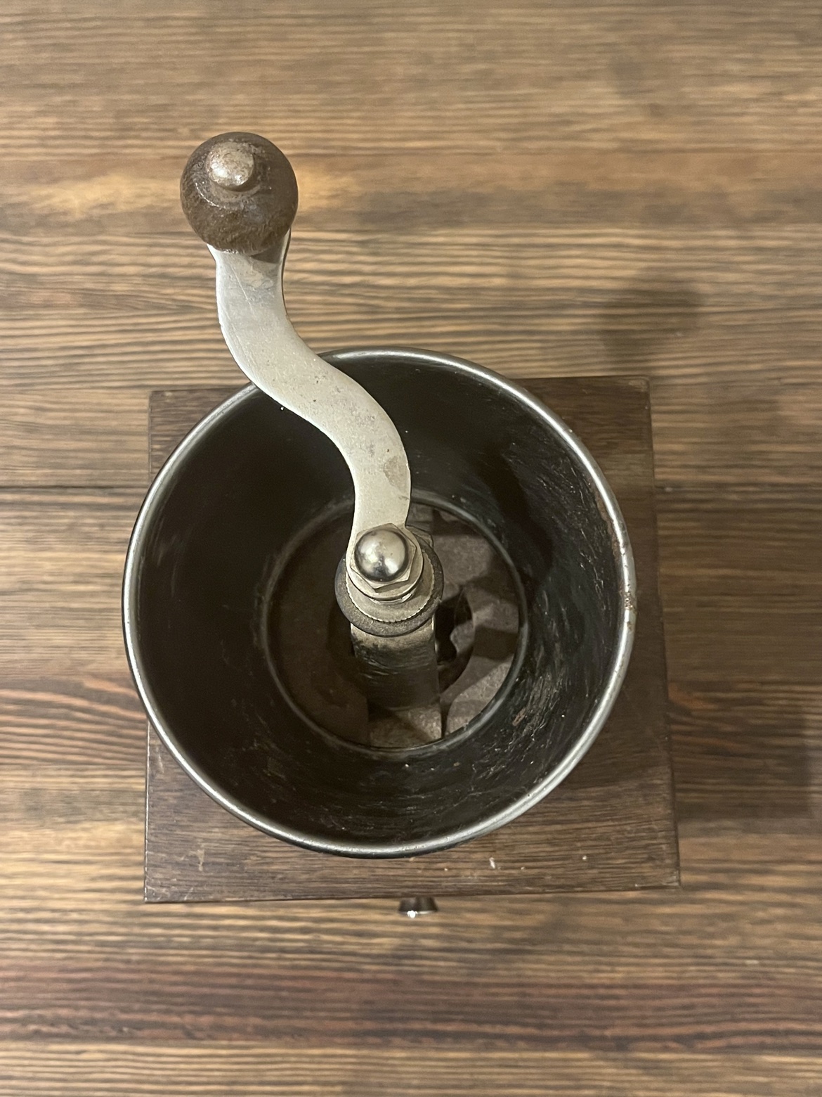 Top-down view of the hopper and hand crank