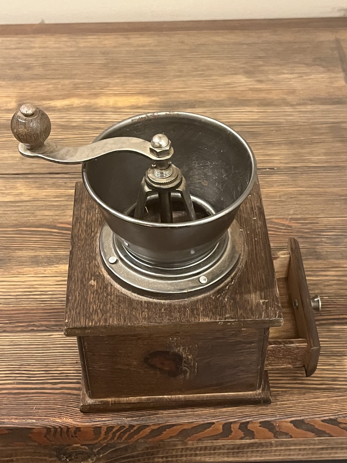 Angled view of the crank, hopper, and replaced nails