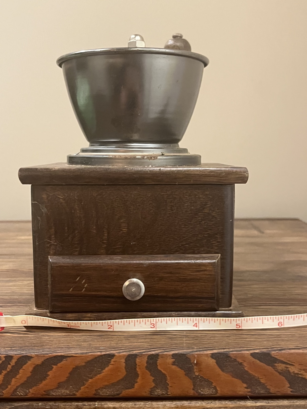 Back view with a tape measure showing about 5 inches wide
