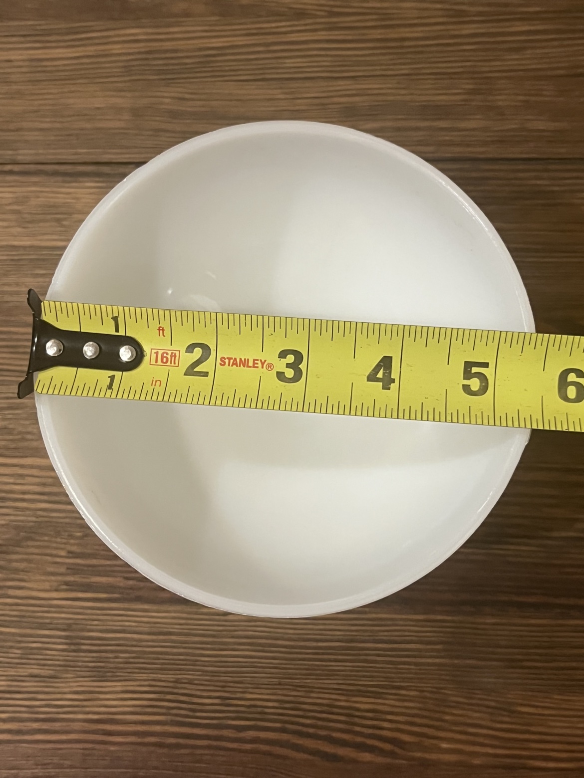 Top-down view with a tape measure showing about 5 and a half inches across