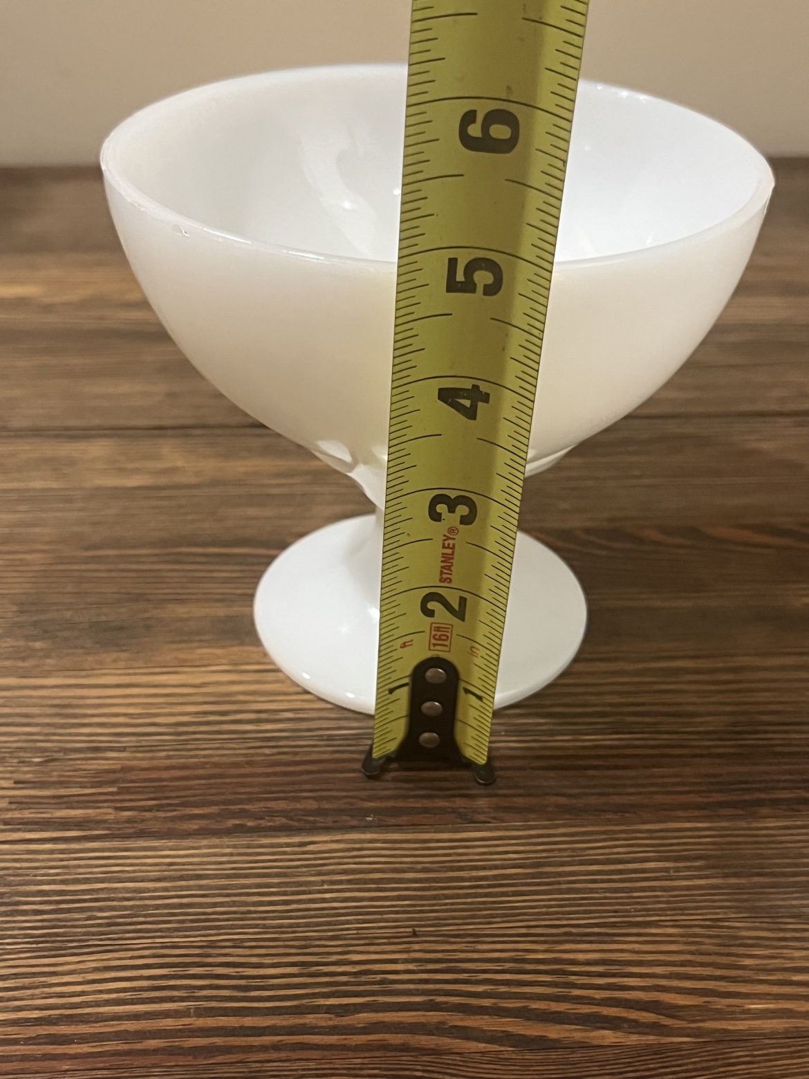 Side view with a tape measure showing about 6 inches tall